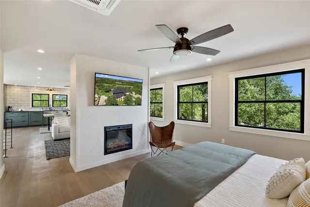 a bedroom with a bed and window