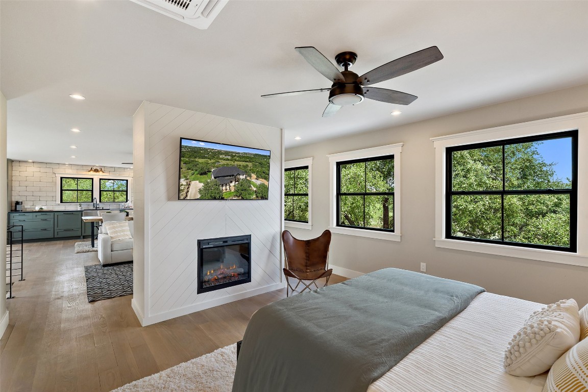 13824 Lone Rider Trail Austin, TX 78738 - Photo 39 of 40 a bedroom with a bed and window