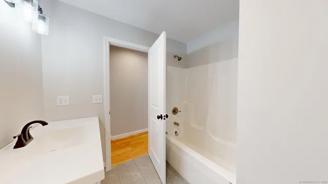 a bathroom with a bathtub