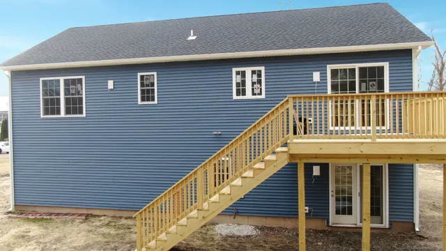 a balcony view with a seating space