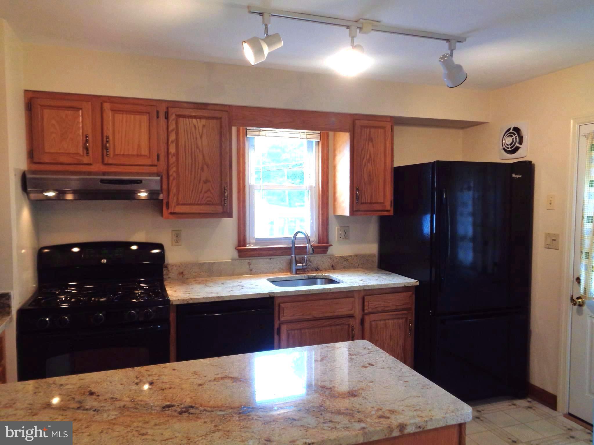 7924 Dalesford Road Baltimore, MD 21234 - Photo 4 of 29 Beautiful Kitchen with rear door leading out back