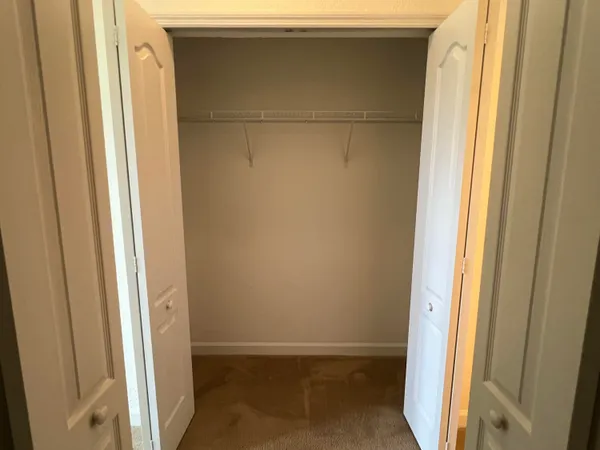 a bathroom with a glass door