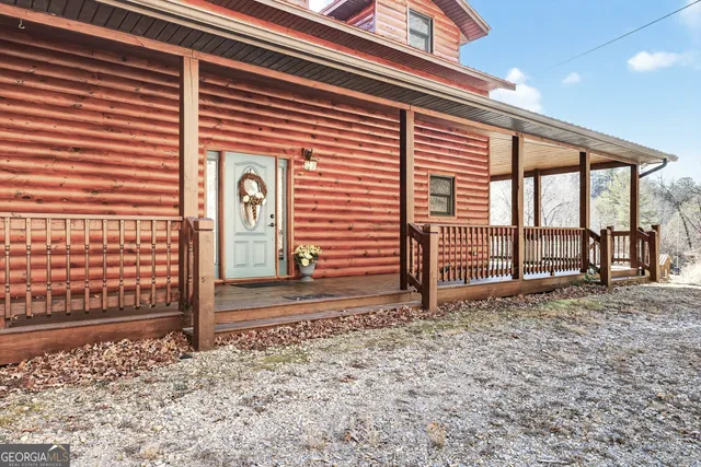 a view of a backyard of the house