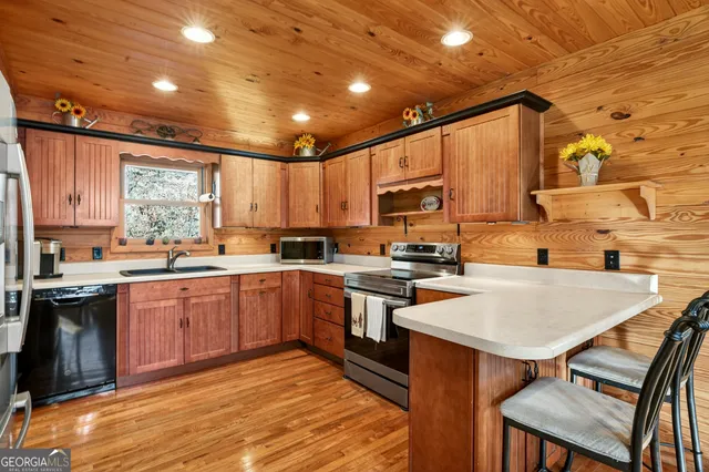 a view of balcony with wooden floor