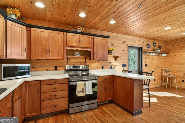 a view of a balcony with wooden floor