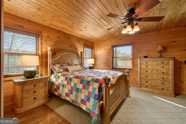 a bathroom with a sink toilet and mirror