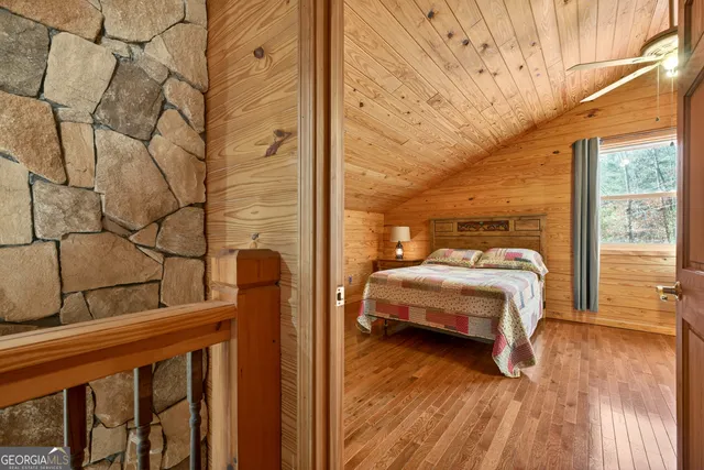 a view of outdoor space with deck and yard