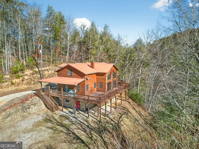 a view of a lake with mountain