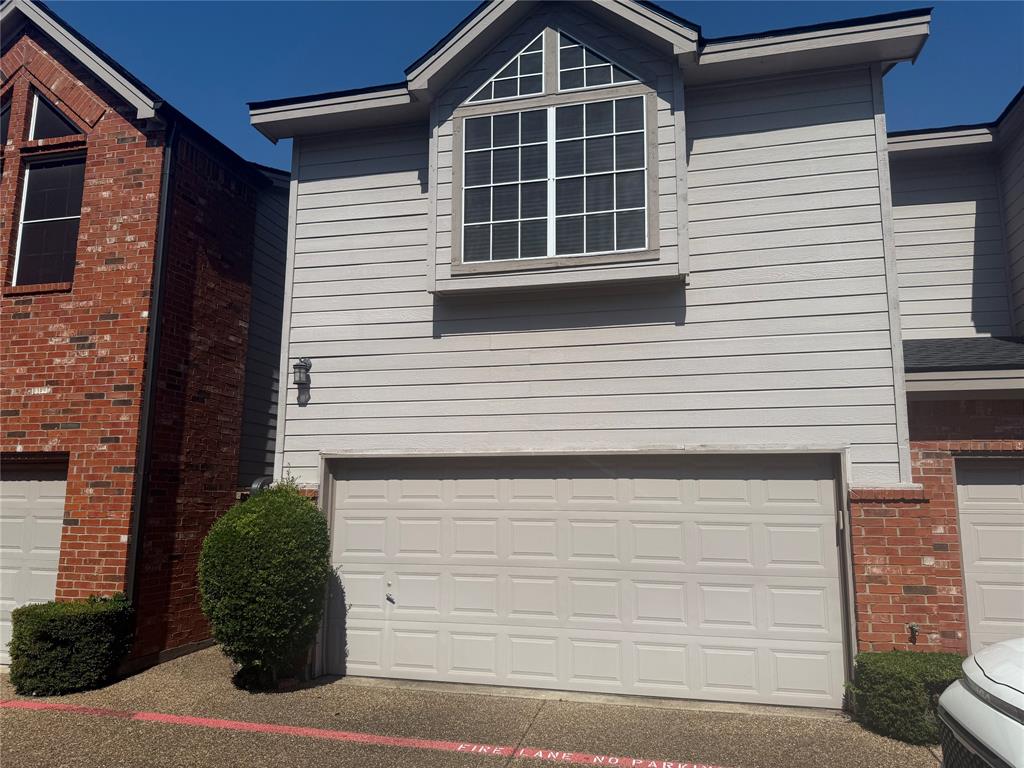 18240 Midway Road, Unit 1204 Dallas, TX 75287 - Photo 23 of 27 a front view of a house