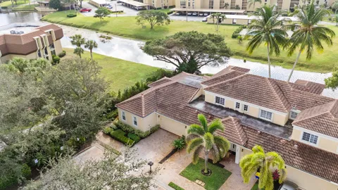an aerial view of a house with a garden and plants