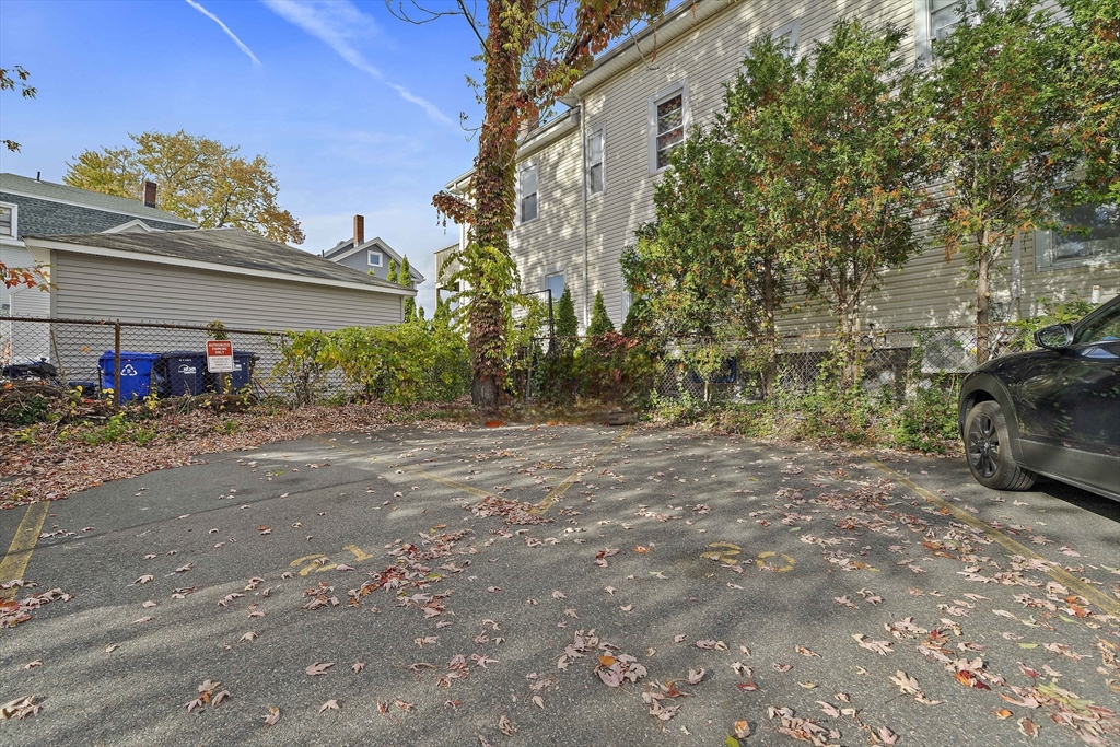20 Radcliffe Road, Unit 112 Boston, MA 02134 - Photo 13 of 13 a view of a yard with cars