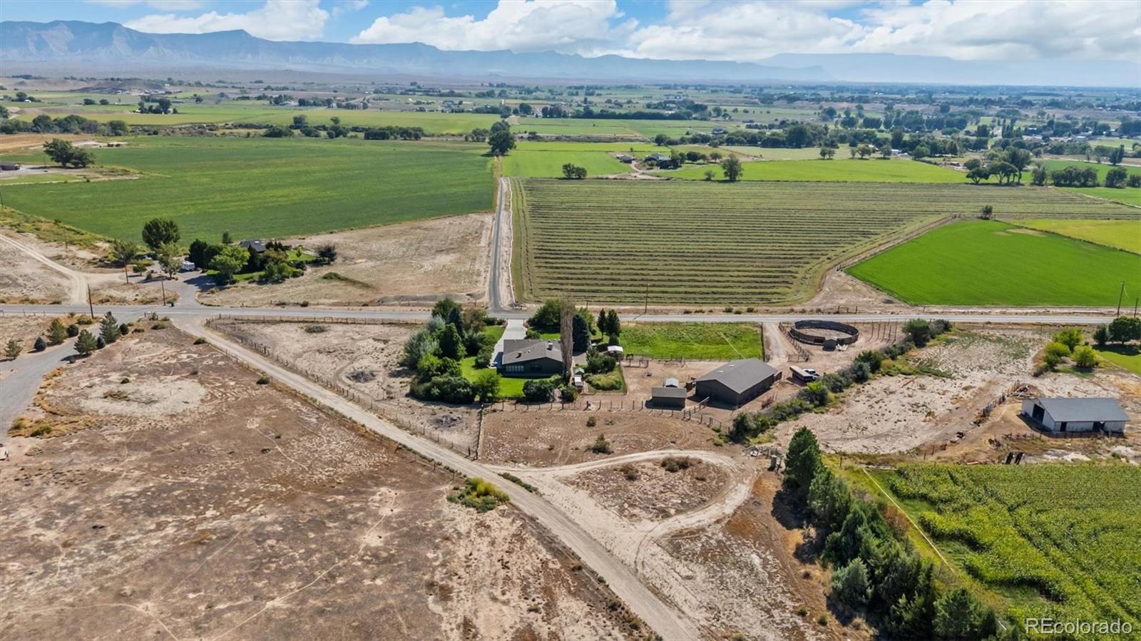 1473 17 Road Fruita, CO 81521 - Photo 18 of 35 an aerial view of a house with a lake view