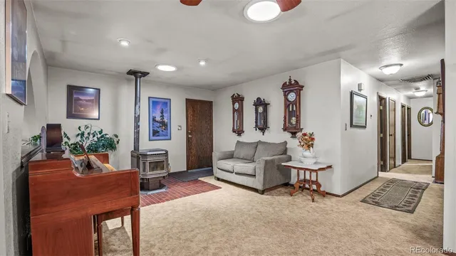 a view of a dining room with furniture and window