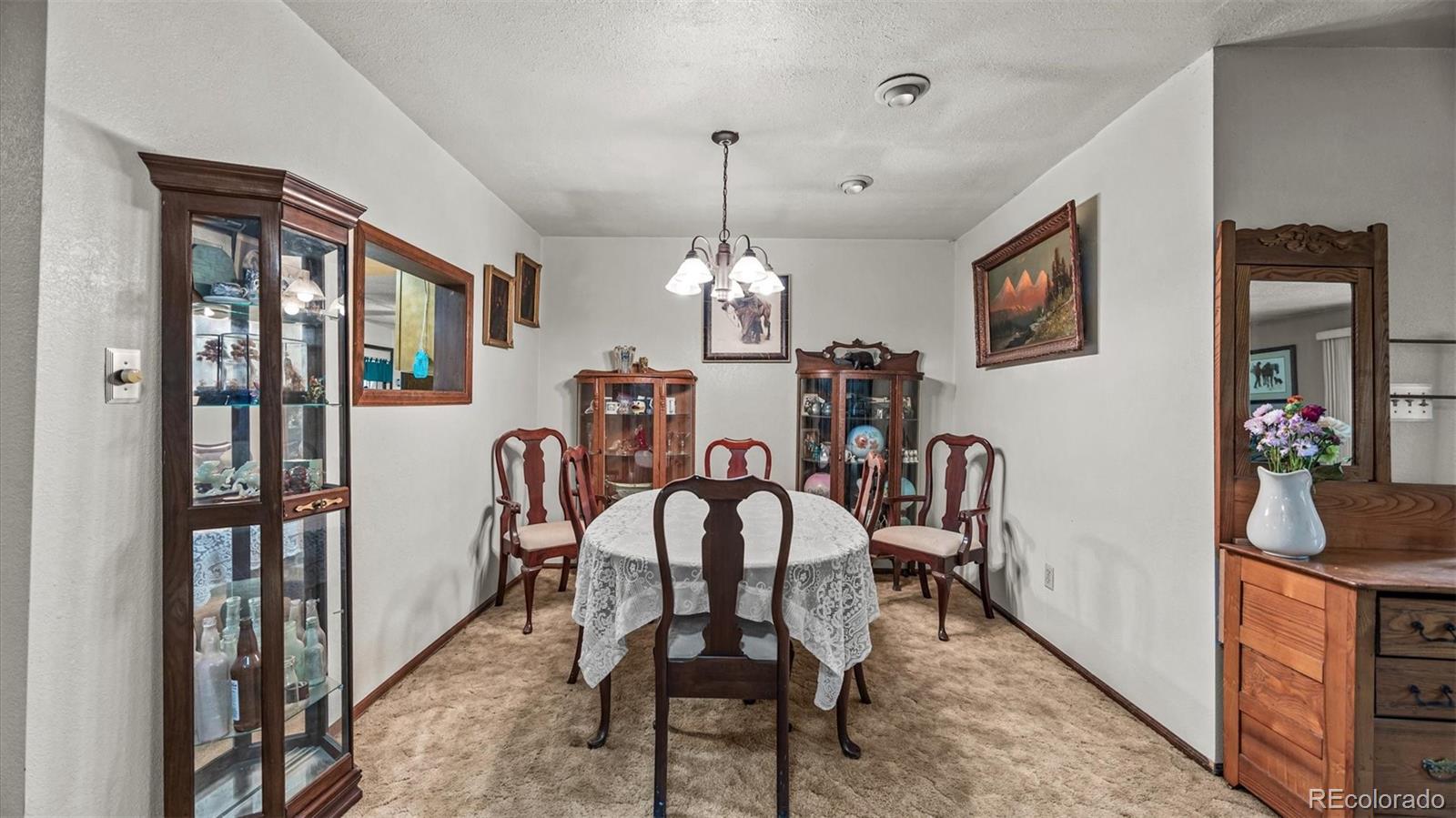 1473 17 Road Fruita, CO 81521 - Photo 22 of 35 a view of a dining room with furniture and window