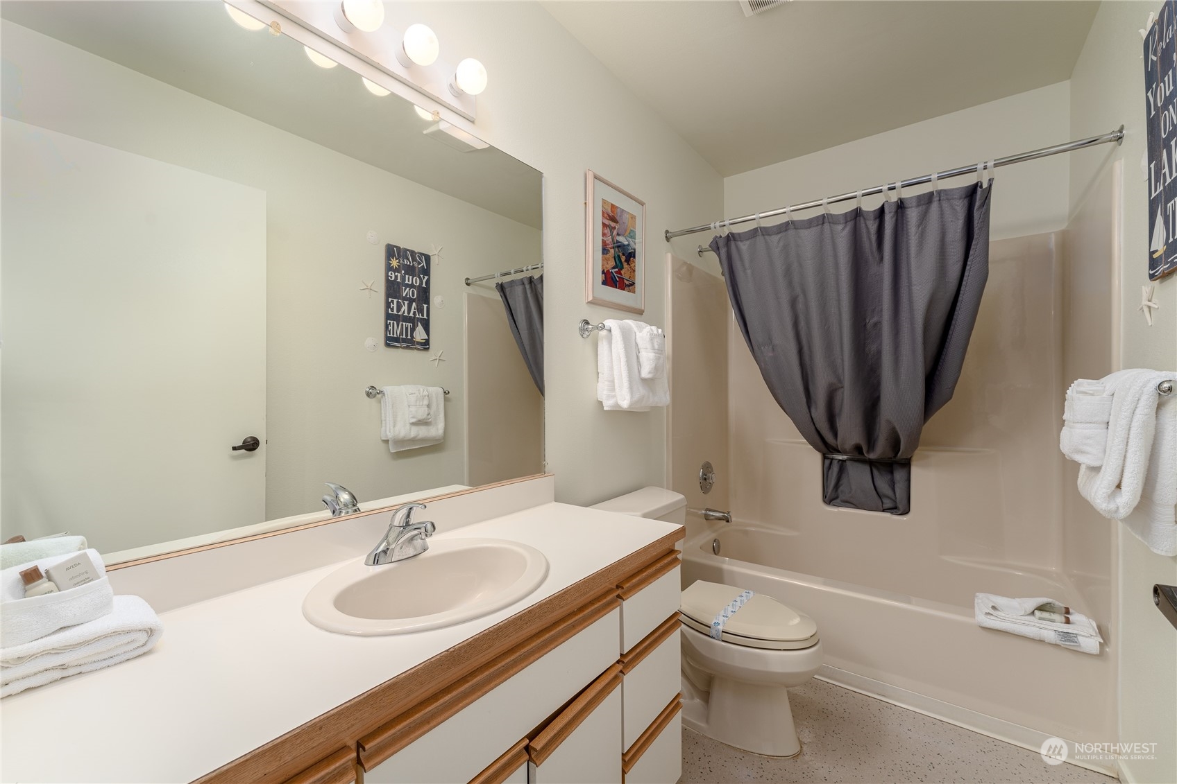 1 Tennis 651-e2 Manson, WA 98831 - Photo 12 of 40 a bathroom with a sink a toilet and a mirror