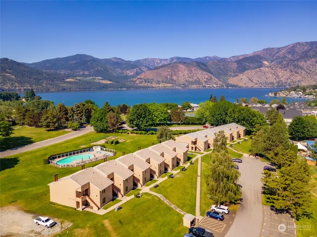 a view of a city with mountains in the background