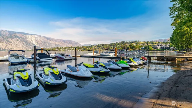 a view of a swimming pool with lounge chairs