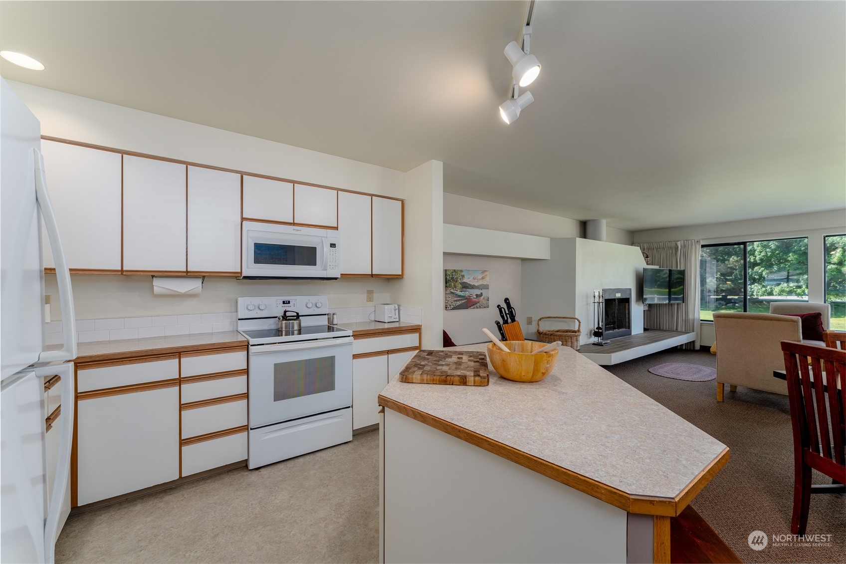 1 Tennis 651-e2 Manson, WA 98831 - Photo 8 of 40 a kitchen with a sink a stove and chairs