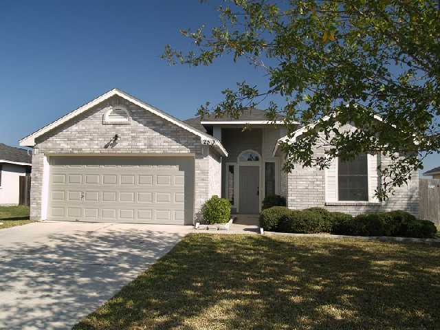 250 Keystone Loop Kyle, TX 78640 - Photo 1 of 1 a front view of a house with a yard and garage