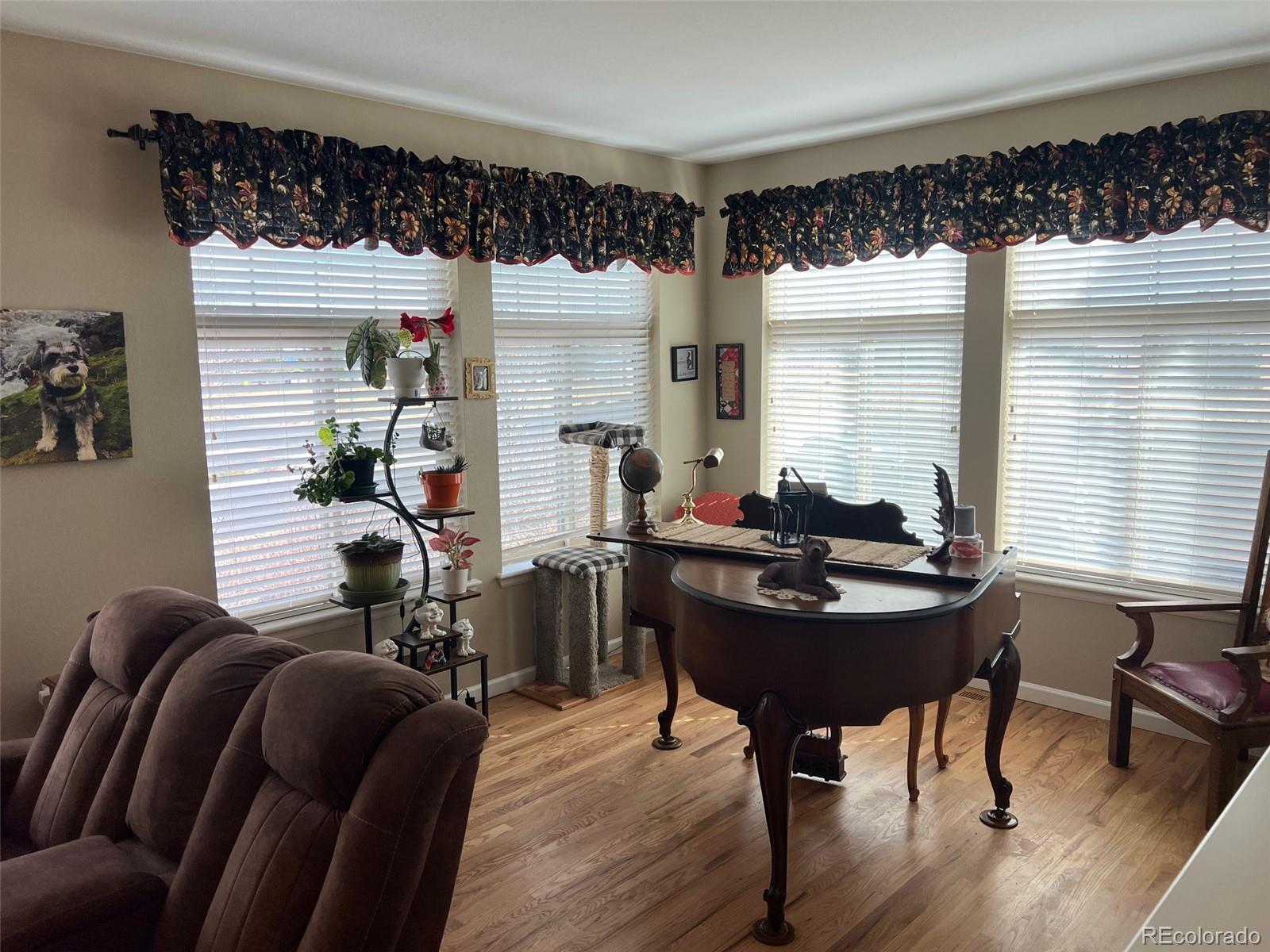 2029 South Flanders Way, Unit B Aurora, CO 80013 - Photo 20 of 42 a work room with furniture and a potted plant