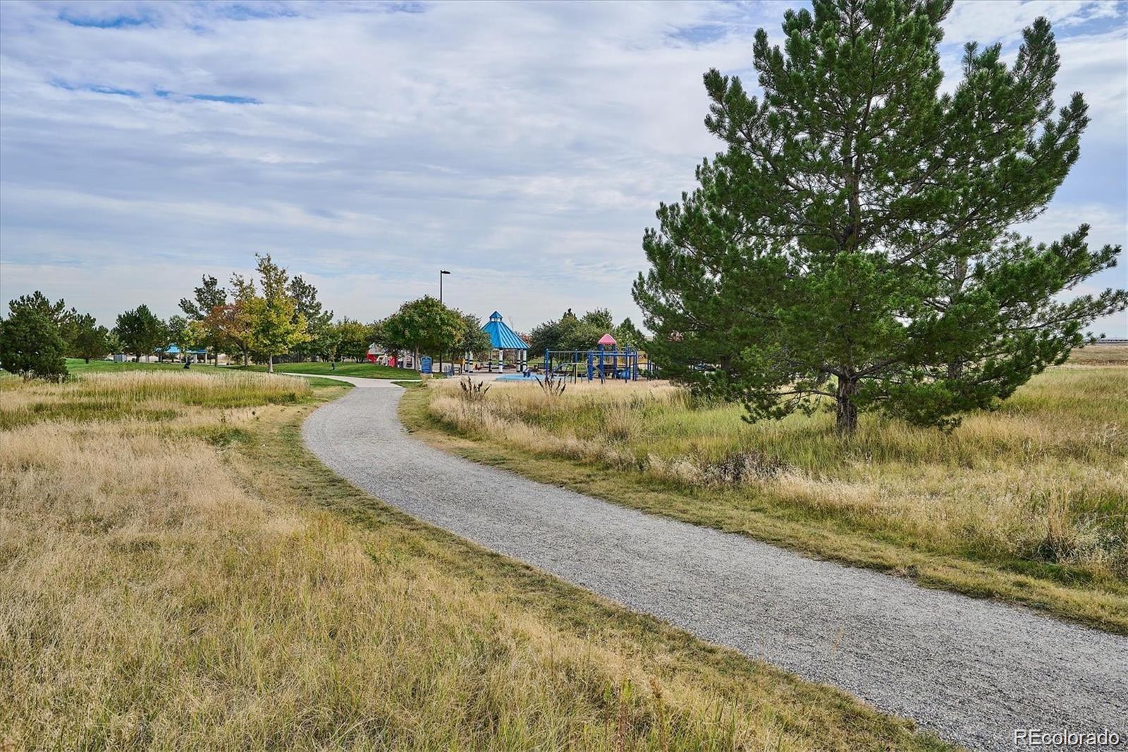 2029 South Flanders Way, Unit B Aurora, CO 80013 - Photo 4 of 42 a view of a lake with outdoor space