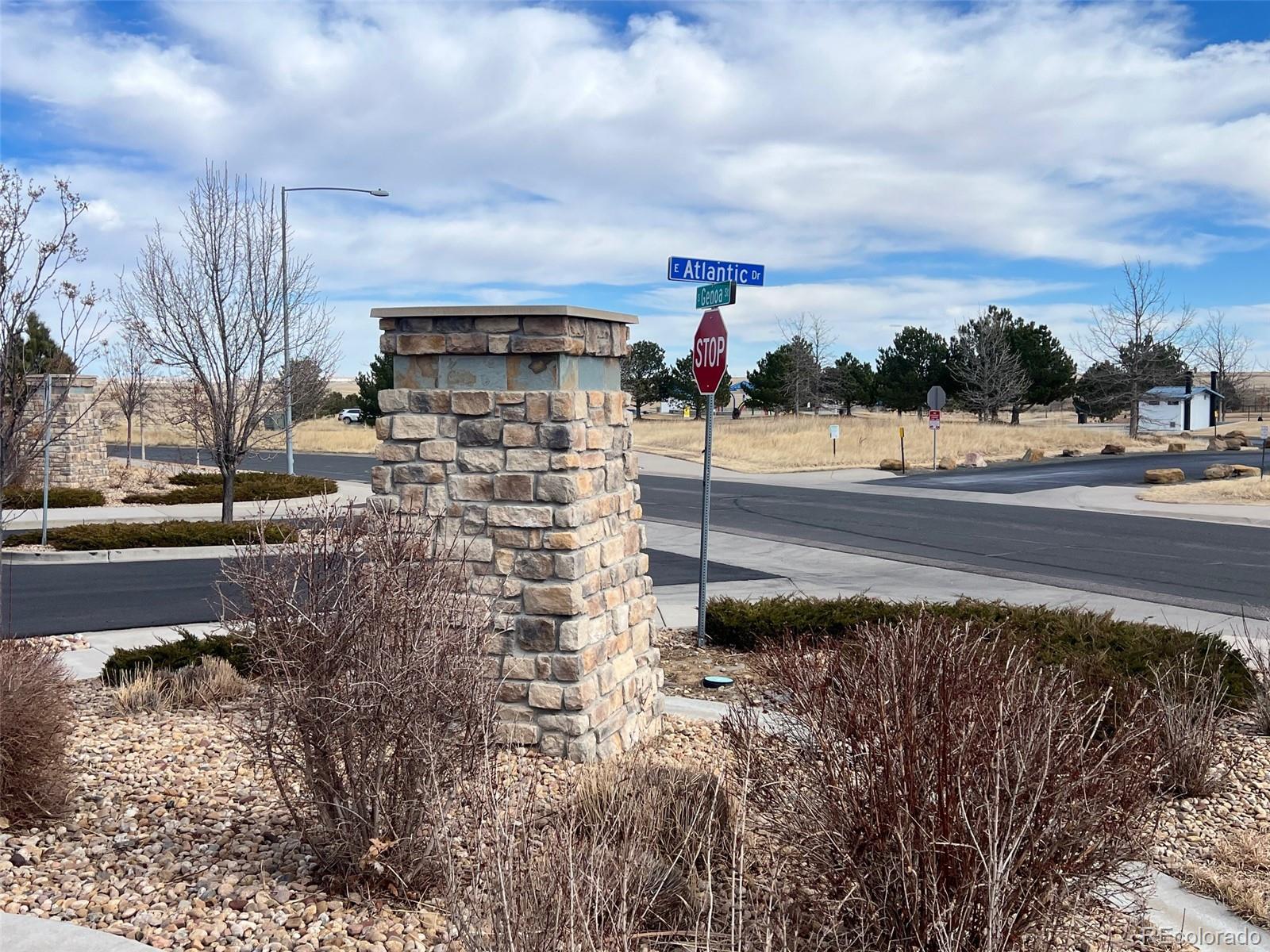 2029 South Flanders Way, Unit B Aurora, CO 80013 - Photo 5 of 42 a view of a pathway with a building in the background