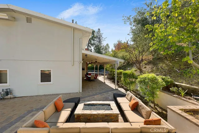 a view of outdoor space yard deck patio and fire pit