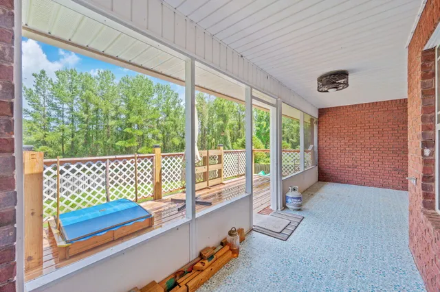 a room with a large window and floor to ceiling window