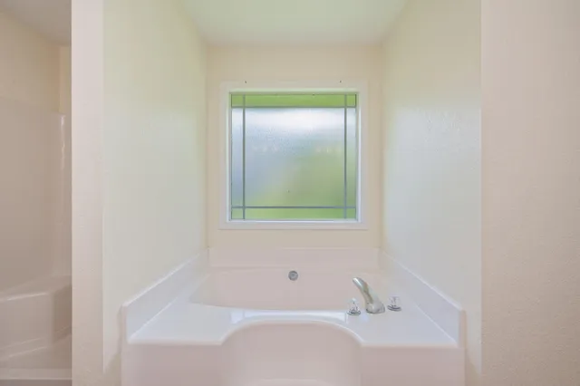 a bathroom with a bathtub