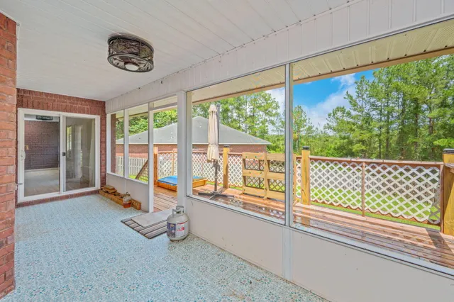 a view of a room with a large window