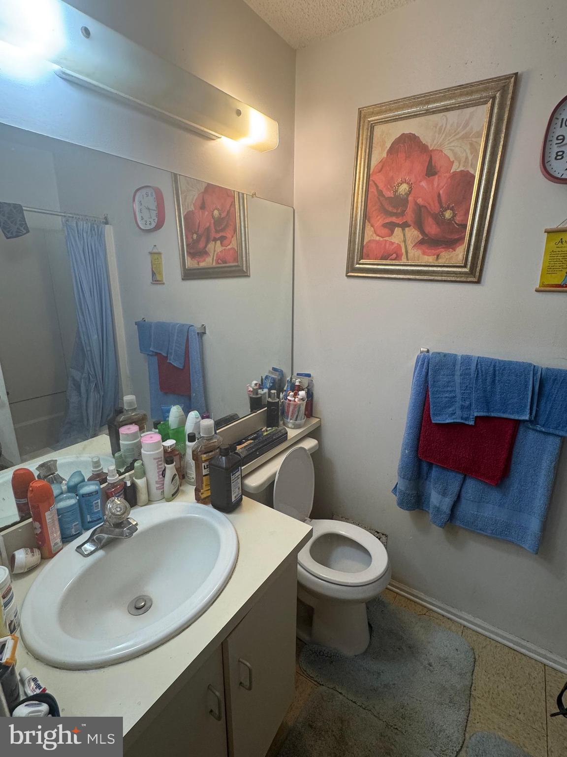 172 Mattix Run Absecon, NJ 08205 - Photo 9 of 9 a bathroom with a toilet a sink and mirror
