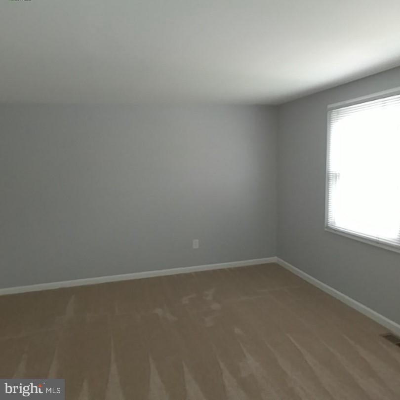 418 Haverhill Road Joppa, MD 21085 - Photo 19 of 28 a view of an empty room with a window