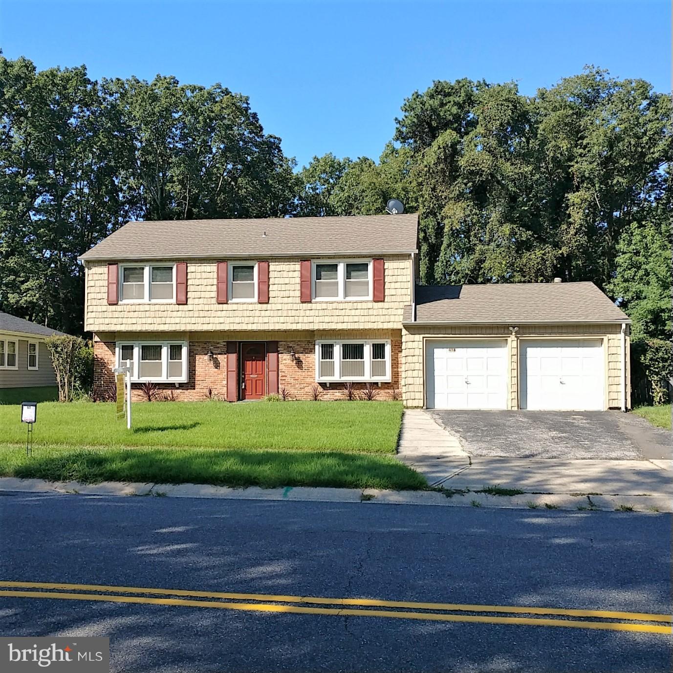 418 Haverhill Road Joppa, MD 21085 - Photo 28 of 28 a front view of a house with a garden