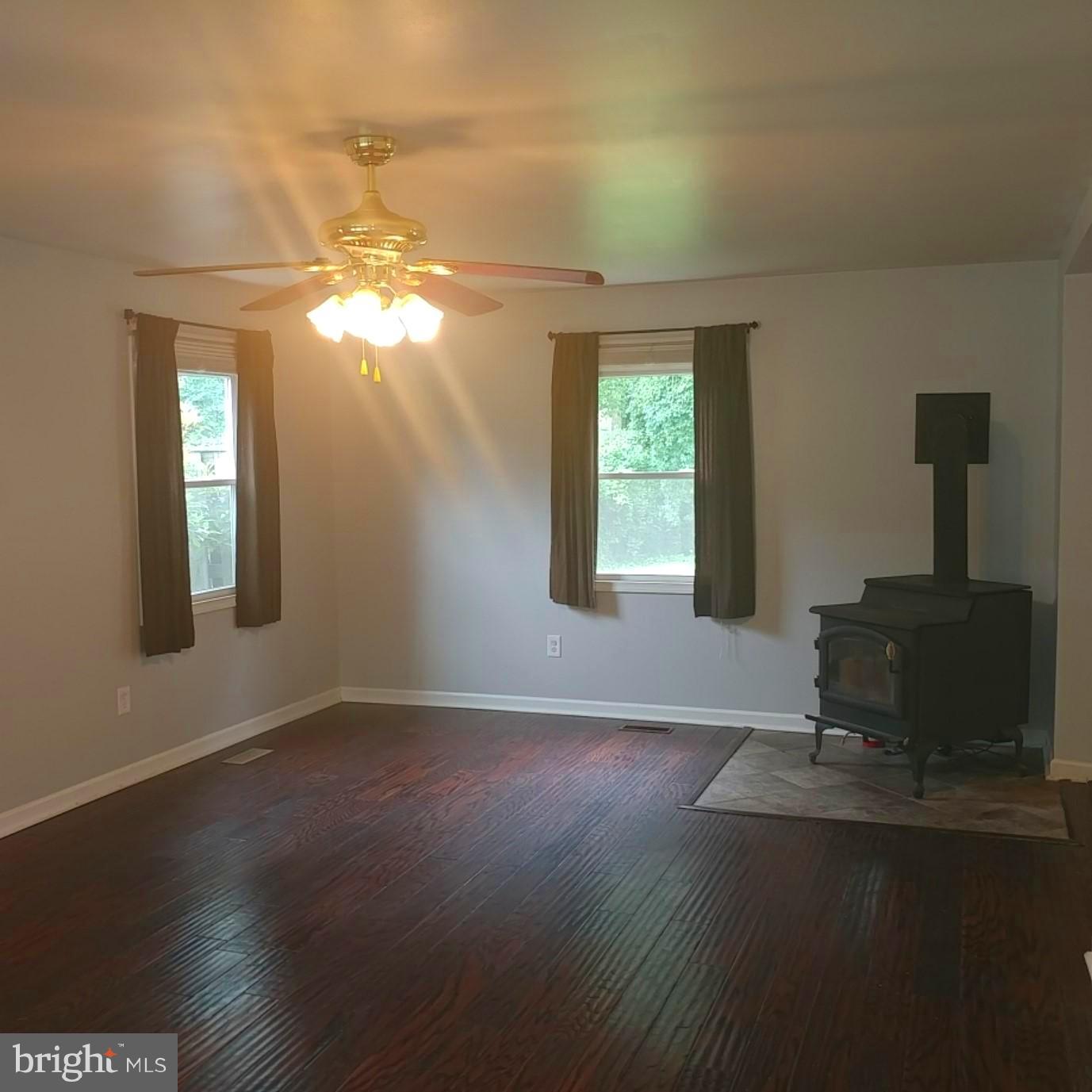 418 Haverhill Road Joppa, MD 21085 - Photo 6 of 28 a living room with hard wood floors and a window