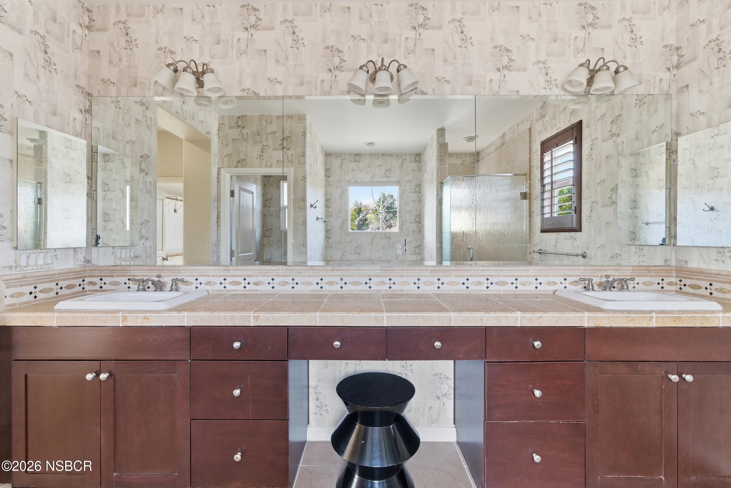 5632 Menemsha Lane Santa Maria, CA 93455 - Photo 32 of 66 a bathroom with a sink and a mirror