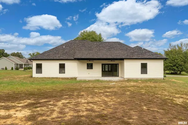 a front view of house with yard