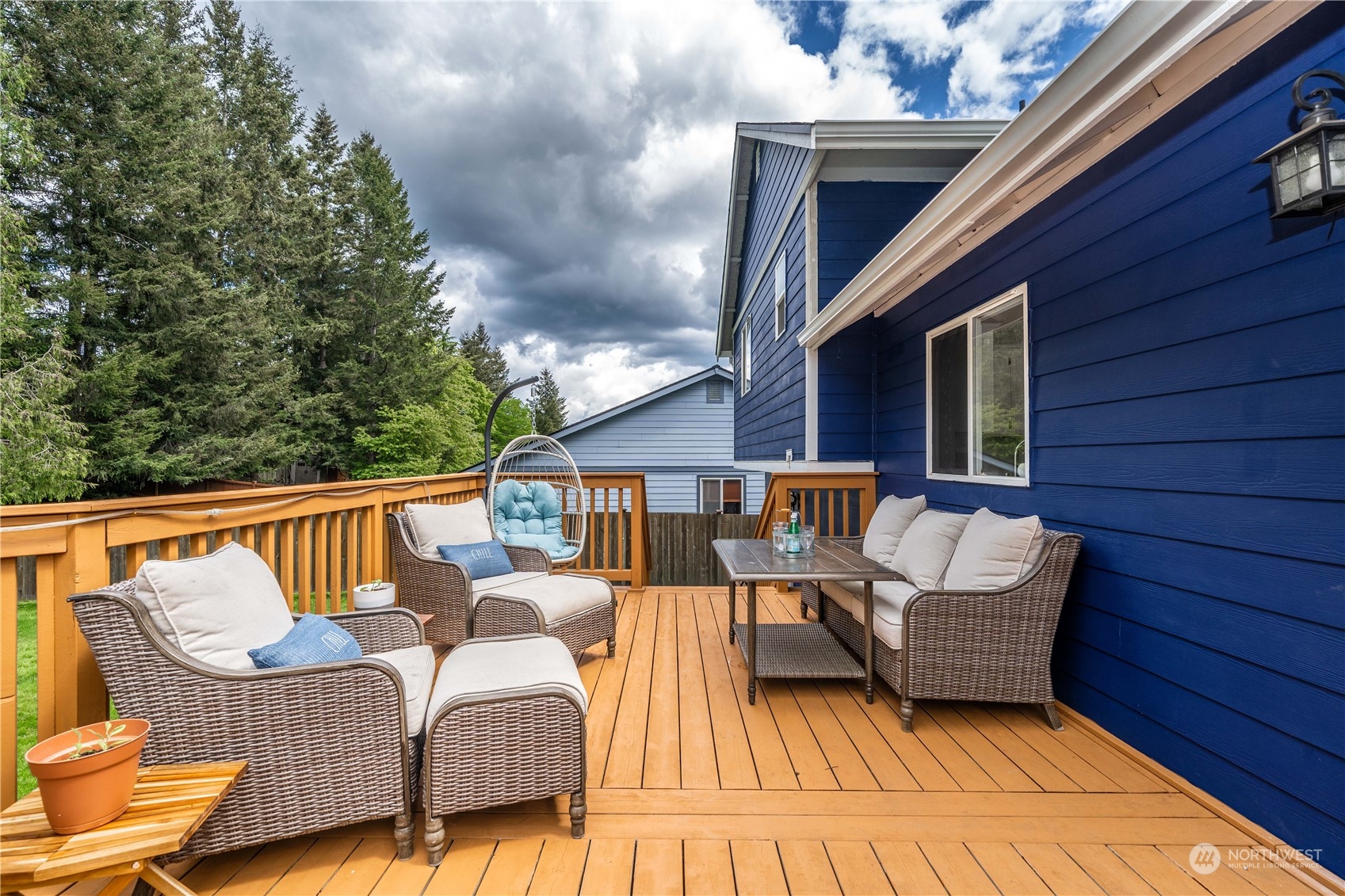 22716 Southeast 264th Place Maple Valley, WA 98038 - Photo 22 of 28 a view of sitting area with furniture on wooden deck