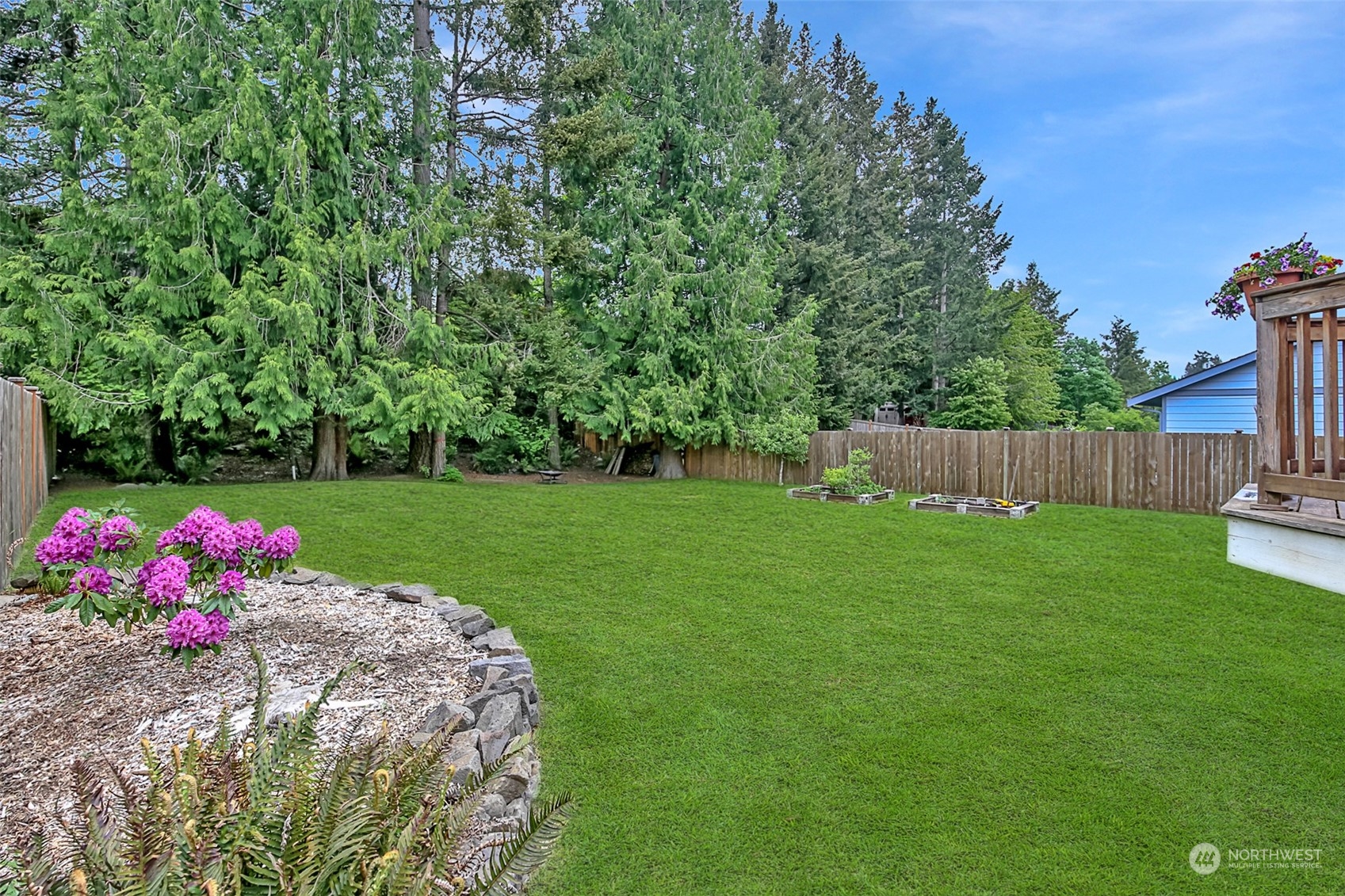 22716 Southeast 264th Place Maple Valley, WA 98038 - Photo 23 of 28 a view of garden with an outdoor space