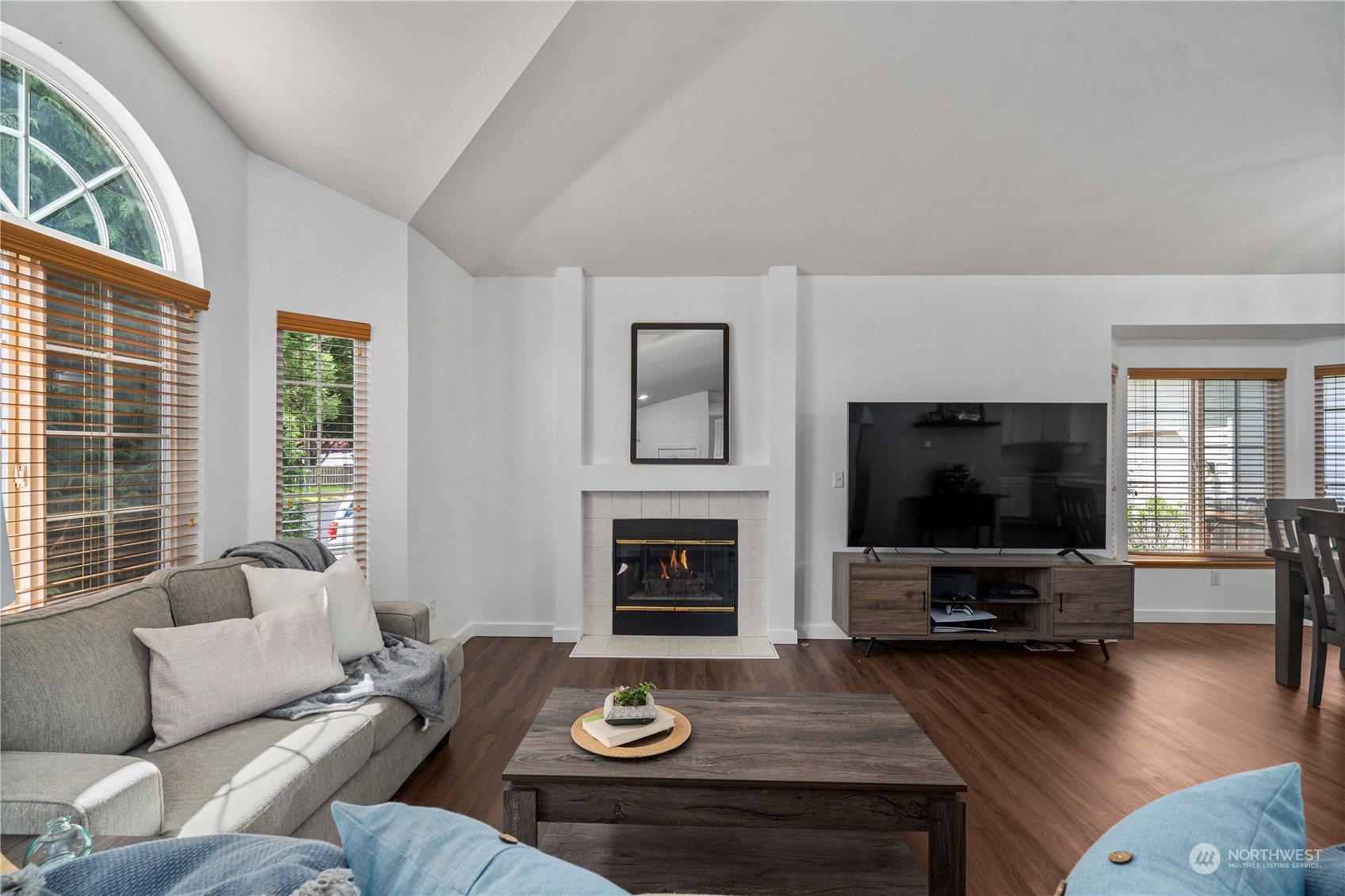 22716 Southeast 264th Place Maple Valley, WA 98038 - Photo 5 of 28 a living room with furniture and a flat screen tv