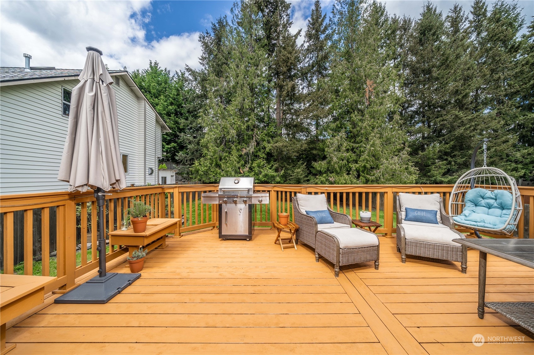 22716 Southeast 264th Place Maple Valley, WA 98038 - Photo 9 of 28 a balcony with view of outdoor seating