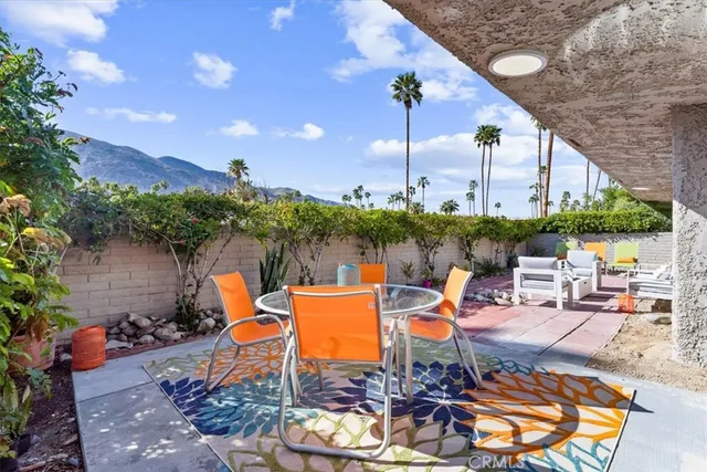 an outdoor space with patio furniture