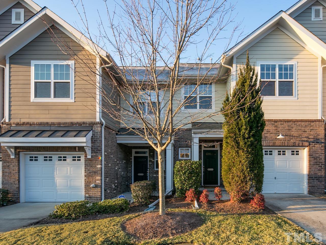 9133 Wooden Road Raleigh, NC 27617 - Photo 1 of 26 You will love the brick and cement fiber board siding.