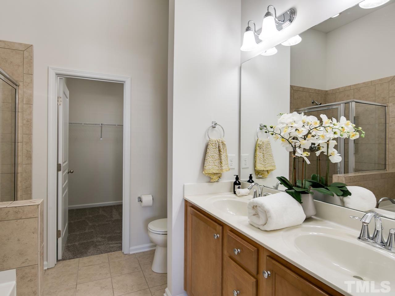 9133 Wooden Road Raleigh, NC 27617 - Photo 18 of 26 Even the closets were painted in January 2022. We wanted to make it super nice for you.