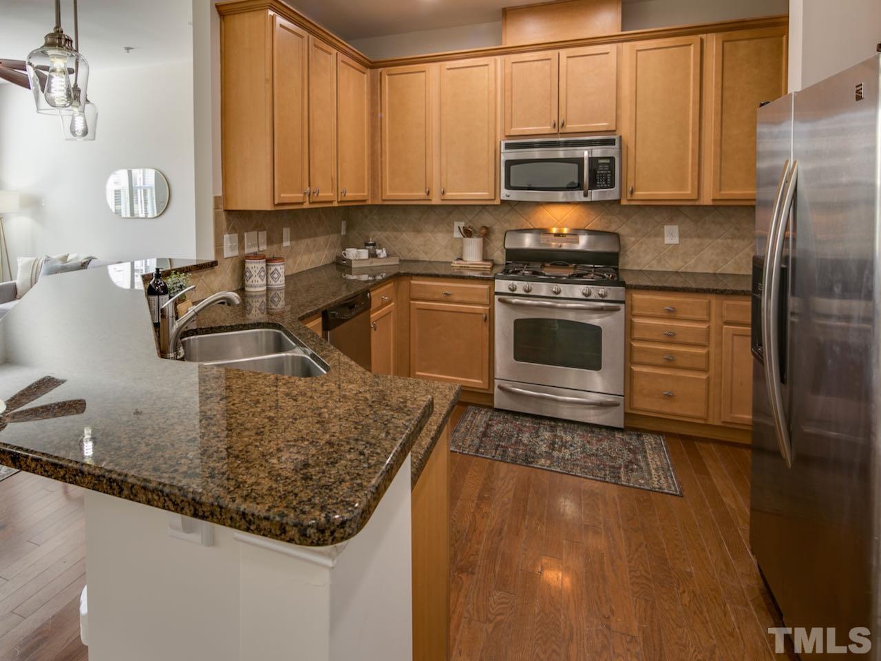 9133 Wooden Road Raleigh, NC 27617 - Photo 3 of 26 You will love the open feel of the kitchen.