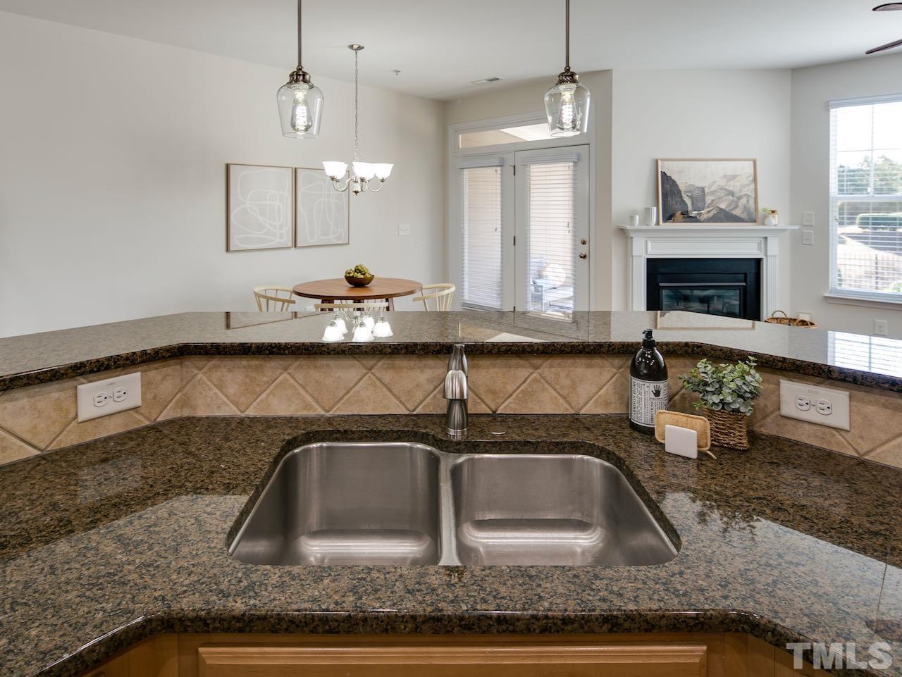 9133 Wooden Road Raleigh, NC 27617 - Photo 6 of 26 Bring your own bar stools.