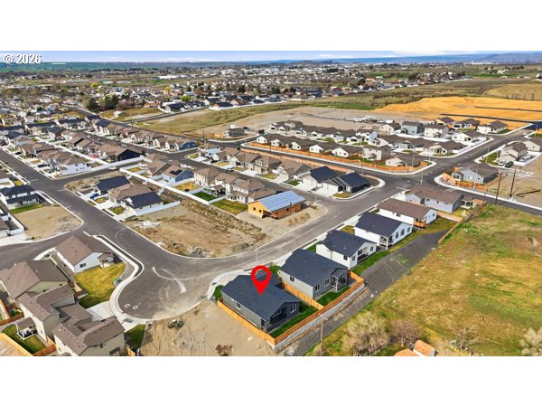 1758 Northeast 9th Street Hermiston, OR 97838 - Photo 23 of 23 an aerial view of residential building and ocean view