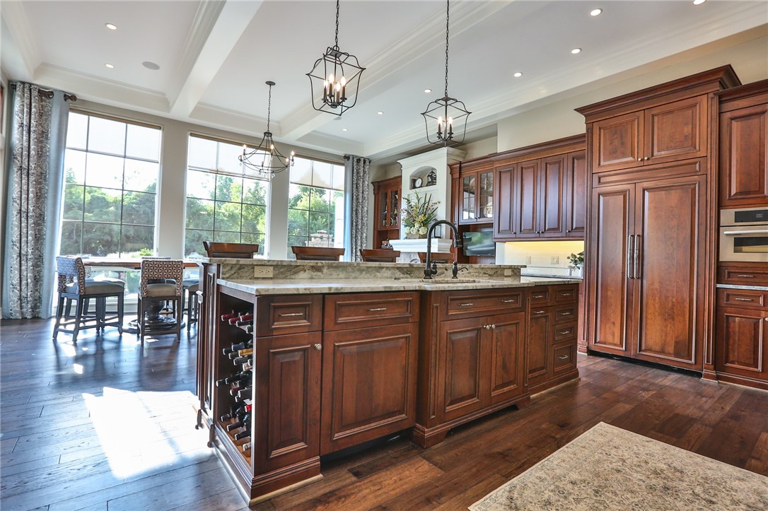 160 Goshawk Drive Victor, NY 14564 - Photo 13 of 50 VIEW FROM THE KITCHEN SINK TOWARD THE HEARTH AREA.