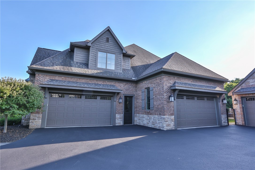 160 Goshawk Drive Victor, NY 14564 - Photo 2 of 50 FOUR OF THE SIX GARAGE BAYS AVAILABLE.