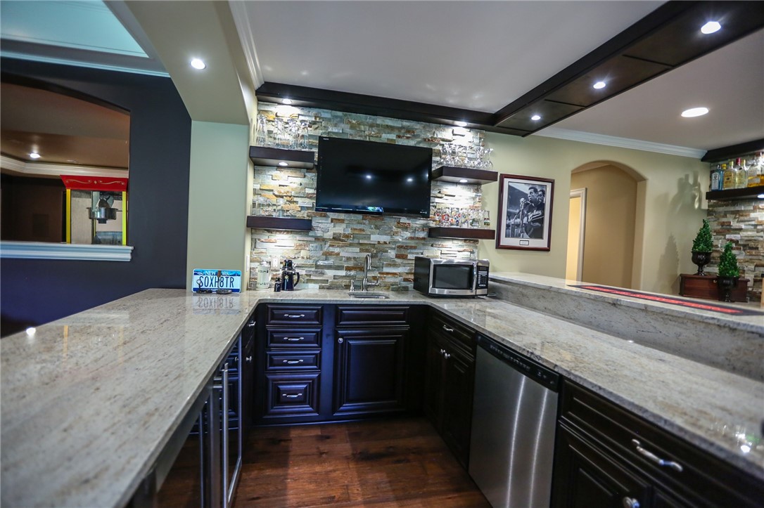 160 Goshawk Drive Victor, NY 14564 - Photo 42 of 50 TO SAY THIS ENTERTAINMENT LEVEL IS WELL-APPOINTED