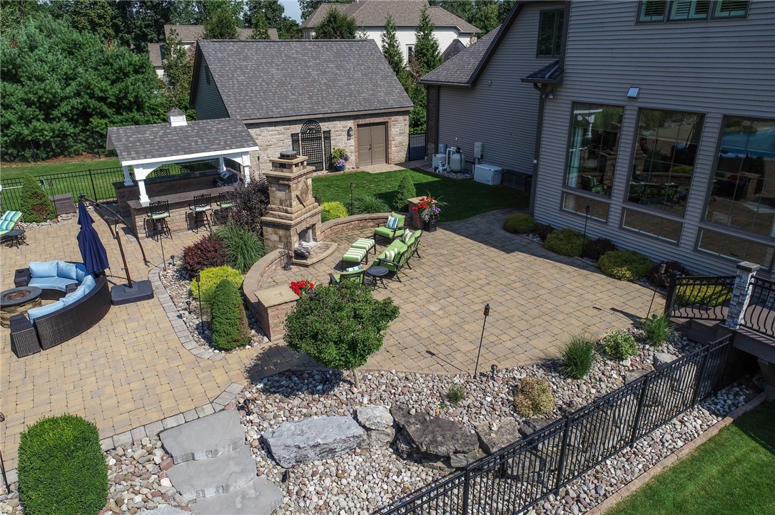 160 Goshawk Drive Victor, NY 14564 - Photo 45 of 50 PARTIAL AERIAL VIEW OF THE BACK PATIO.